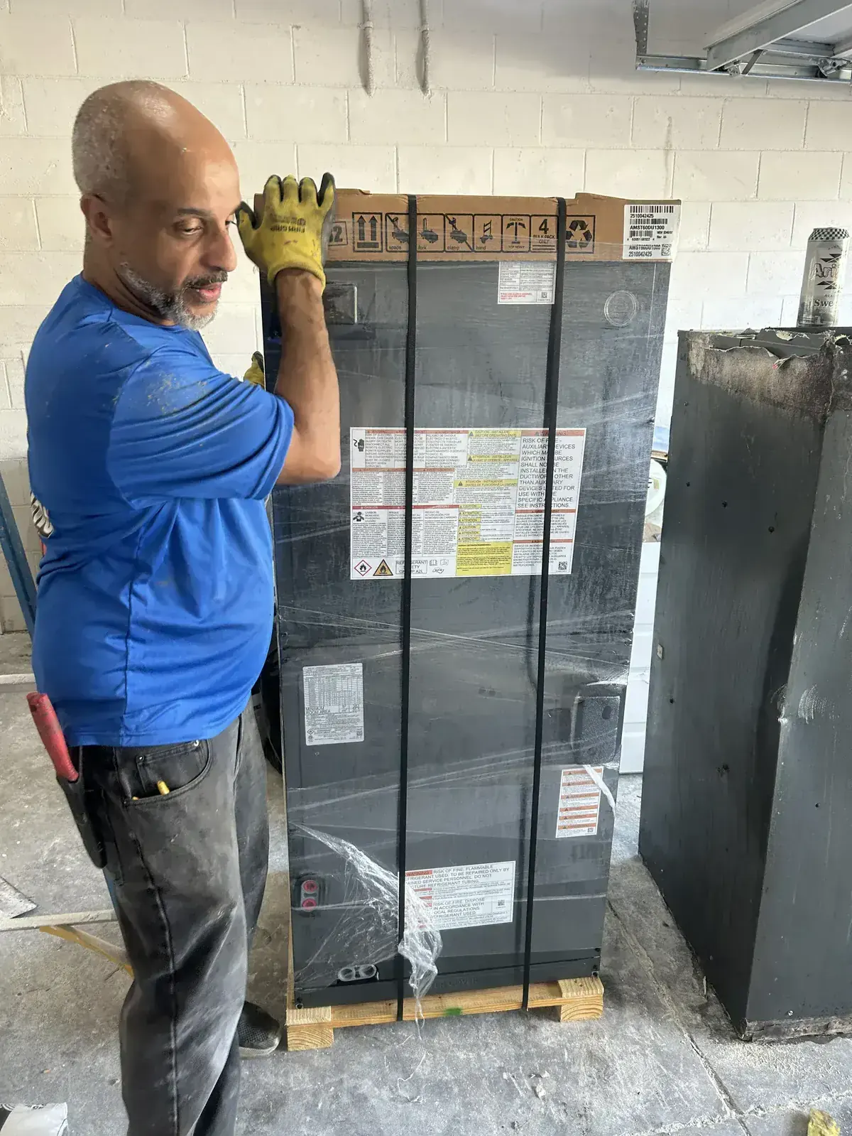 Smart Home Air & Heat technician measuring for AC system installation in Orlando, FL