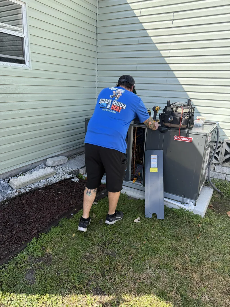 HVAC preventative maintenance tune-up on outdoor AC unit in East Orlando